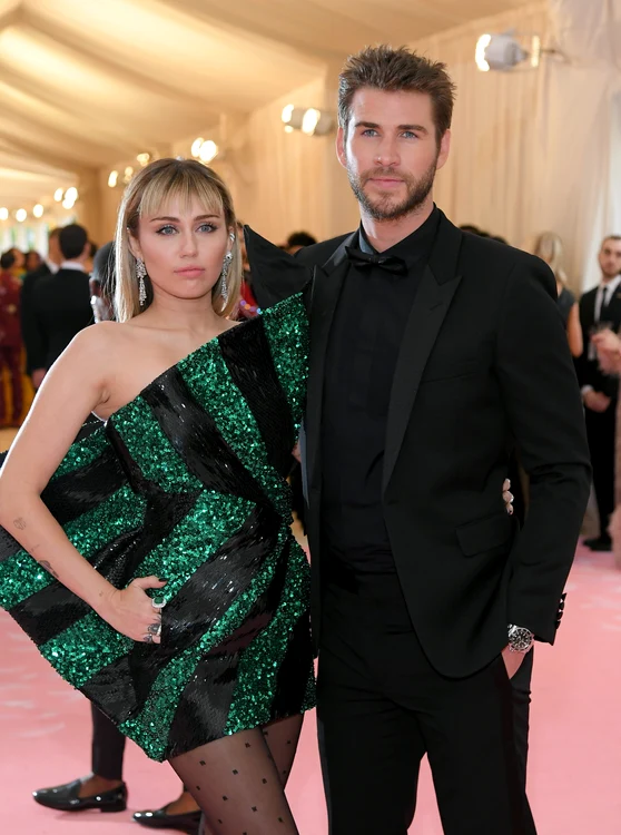 Miley Cyrus and Liam Hemsworth made love under the table at the Oscars (Photo: GettyImages)