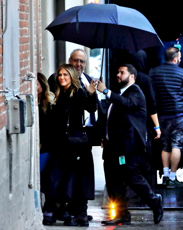 Jennifer Aniston in a black coat